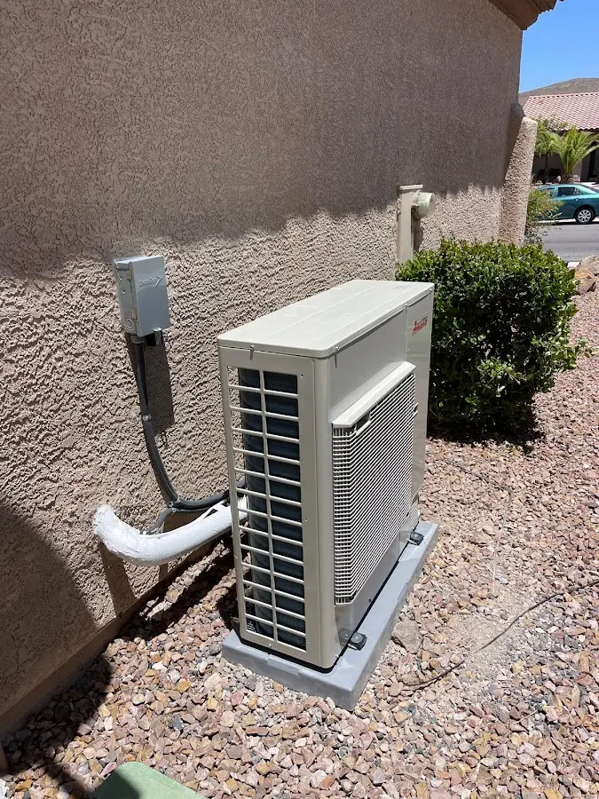 Residential air conditioning condenser unit in Cumru